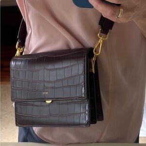 Cross body deep brown mini bag  w sections.